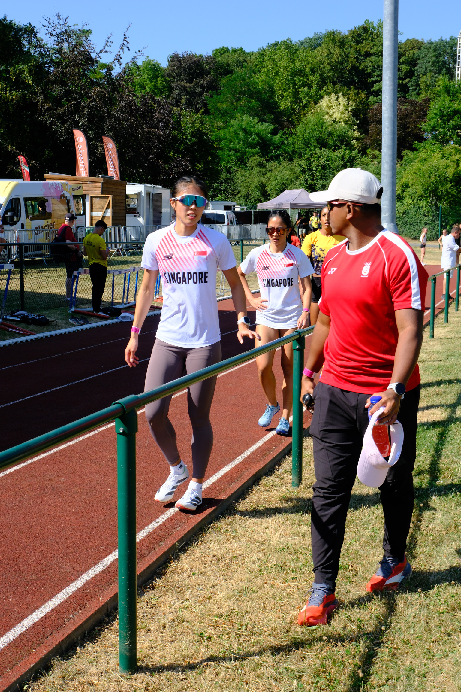 Coach Khai talking through a session with an athlete