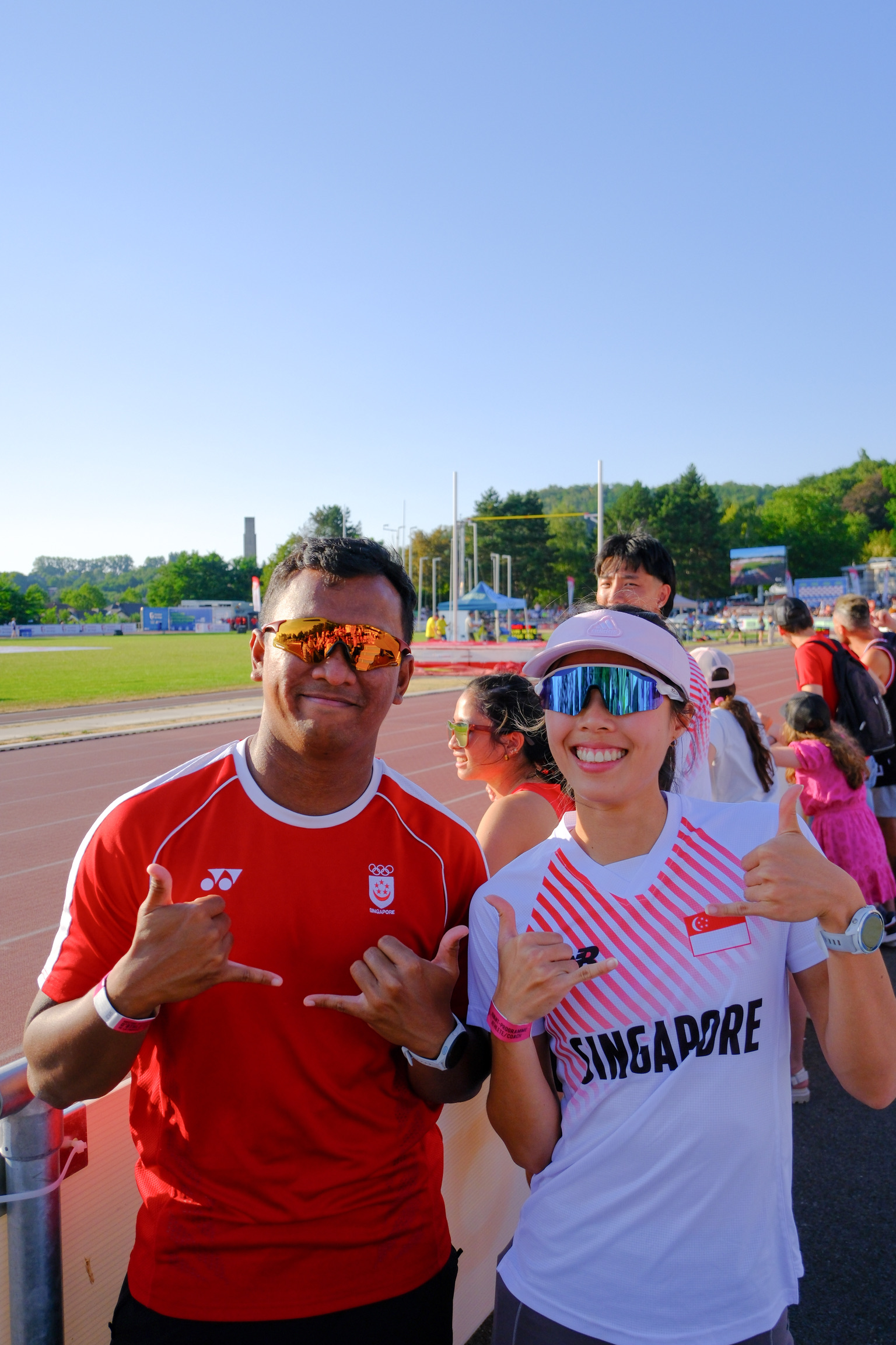 Coach and athlete on the track at Home of Athletics